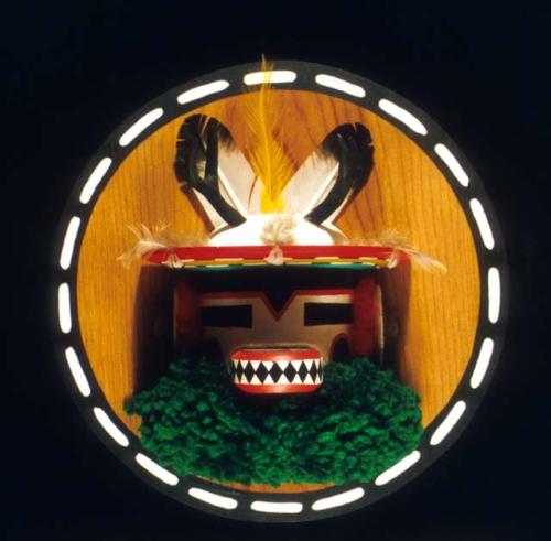 Deer kachina circular plaque of wood and cottonwood root