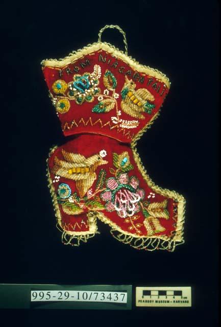 Beaded whimsey in the shape of a red high heeled boot