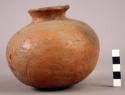 Small restored red pottery jar and 1 unrelated sherd