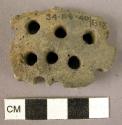 Fragment of pottery strainer