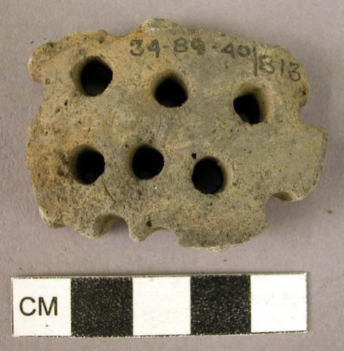 Fragment of pottery strainer