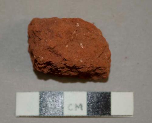 Red mineral color, lumps of soft stone