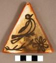 Triangular pottery tile