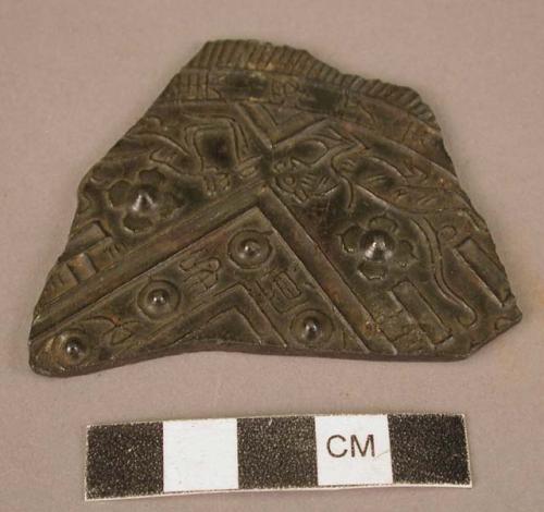 Fragment of bronze mirror of type called by foreign collectors TLV