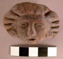 Human head; terra cotta; from a vase