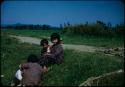 Three children on bank of canal