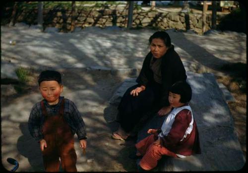 Woman and two children