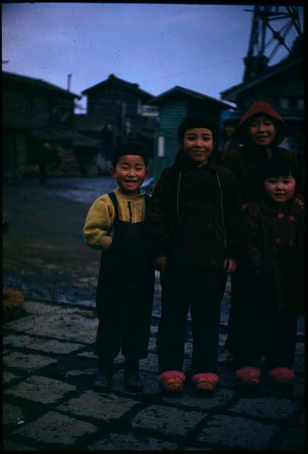 Woman and three children