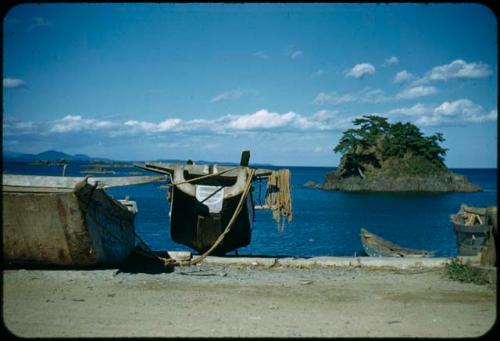 Boats docked, with island in background