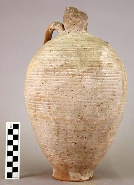 Two handled jar of red-brown ware