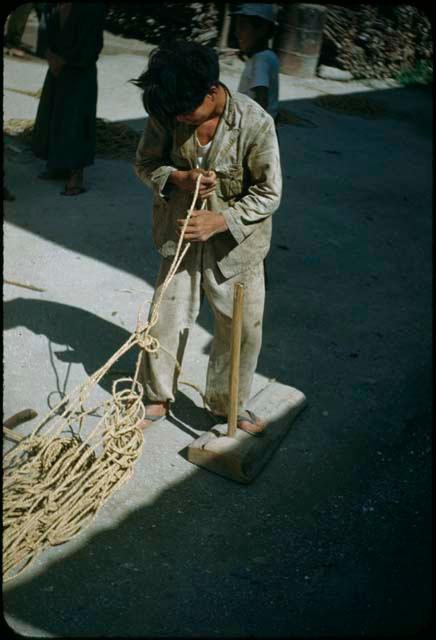 Man with rope or net