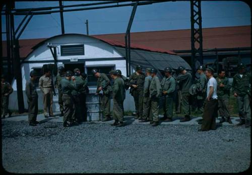 Soldiers being treated with miteacide