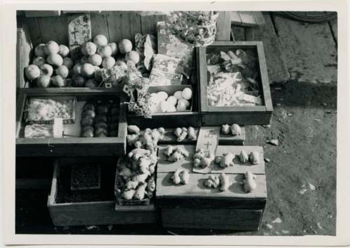 Market stand with satoimo (Jerusalem artichoke), kaki (persimmon) and tamago (eggs)