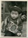 Boy with cracker box