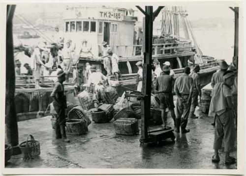 Unloading fishing boat