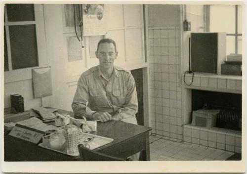 George Butler in dispensary at Camp Matsushima