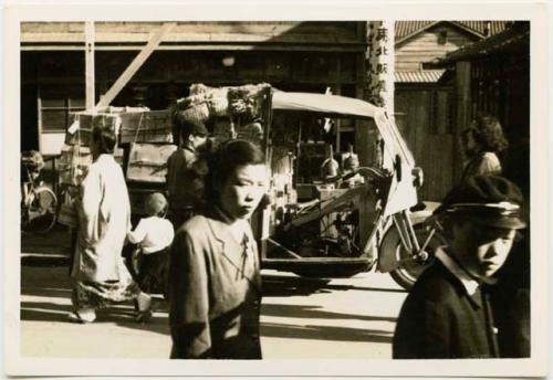 Street scene with motorcycle truck