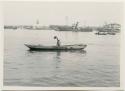 Fisherman in boat in Matsushima Bay