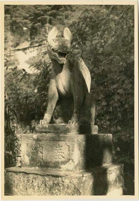 Temple guardian (stone sculpture)