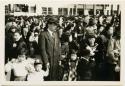 Crowd listening to election campaign speeches