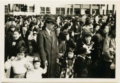 Crowd listening to election campaign speeches