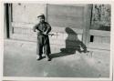 Boy with toy gun