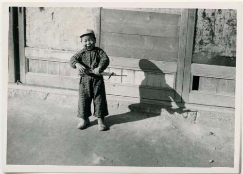 Boy with toy gun