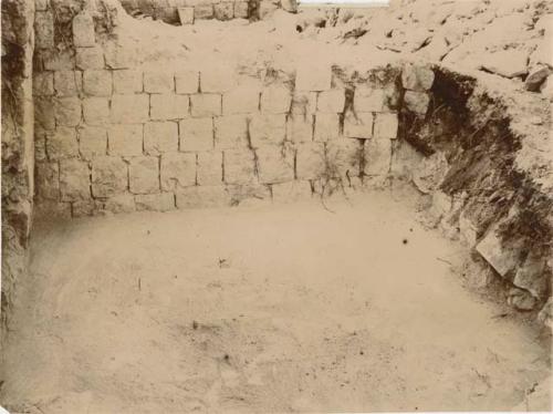 Partially excavated wall and floor in Mound 6