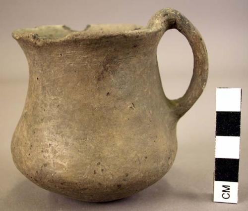 Handled pottery cup