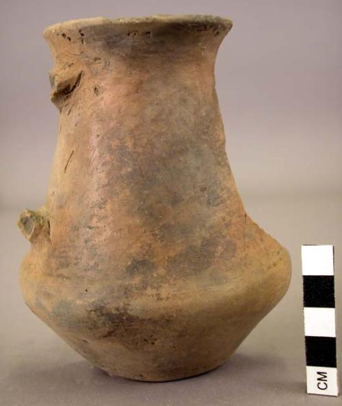 Tall-necked pottery vessel