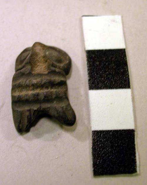 Pottery amulet - human?