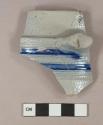 Gray salt-glazed stoneware mug or tankard rim and body fragment with partial handle, gray paste, molded, cobalt decorated