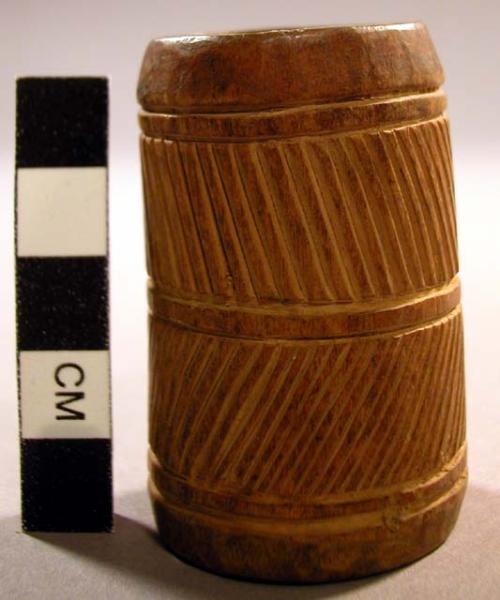 Wooden box with incised linear design