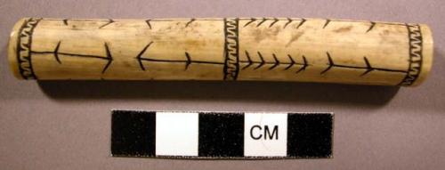 Snuff tube with arrow shaped incised markings