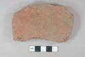 Red ceramic roof tile fragment, visible temper