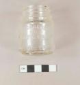 Intact colorless glass vaseline jar, threaded finish, molded surface "CHESEBROUGH / MANFG. CO. CD / NEW-YORK"