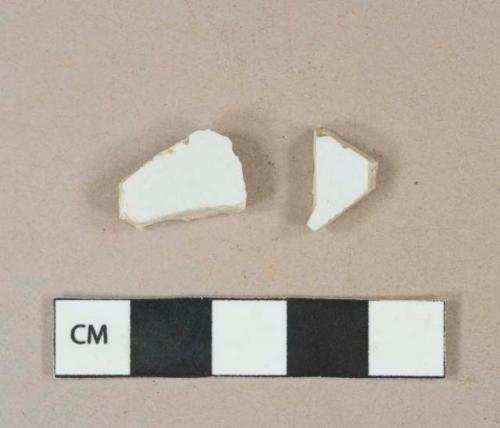 White undecorated ironstone vessel body fragments, white paste