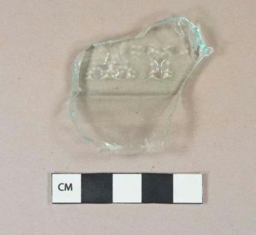 Light aqua vessel glass body fragment, embossed letters "...AY...", likely bottle