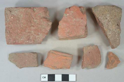 Red brick fragments; red ceramic roof tile fragments