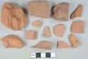 Red brick fragments; 2 red ceramic roof tile fragments