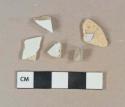White undecorated pearlware vessel body fragments, white paste; 1 fragment undecorated white tin-glazed earthenware vessel body fragment, buff paste