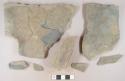 Light gray mudstone fragments, likely architectural