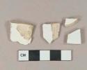 Undecorated whiteware vessel body fragments, white paste