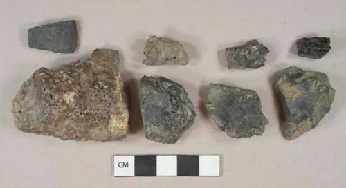 Burned coal fragments, 2 slag fragments