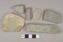 Light gray mudstone fragments, possibly architectural