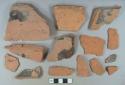 Brown lead glazed redware vessel body and rim fragments