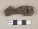 Ferrous metal key fragment, heavily corroded