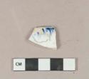 Blue shell-edged pearlware vessel rim fragment, white paste