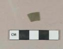 Olive green flat glass fragment