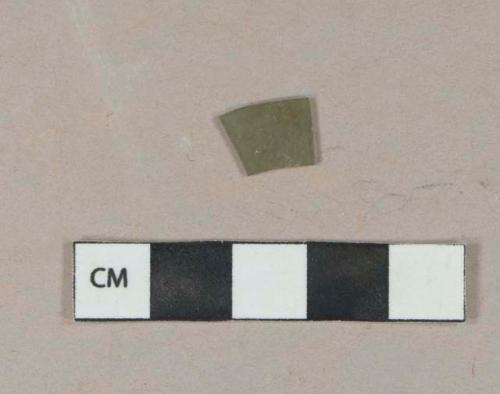 Olive green flat glass fragment